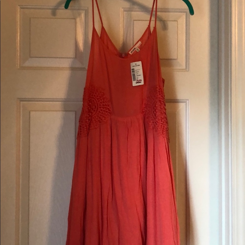 coral mini dress with side detail design